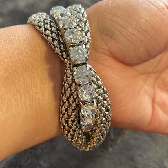 Set of three attached silvertone bracelets 2
chainsaws one with crystals 80’s - Picture 3 of 3